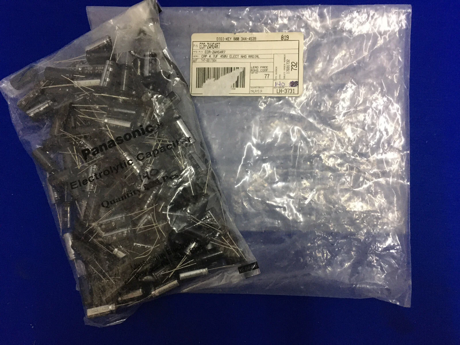 1 PKG CONTAINING 140 – PANASONIC/DIGI-KEY ECA-2WHG4R7 ELECTROLYTIC CAPACITORS